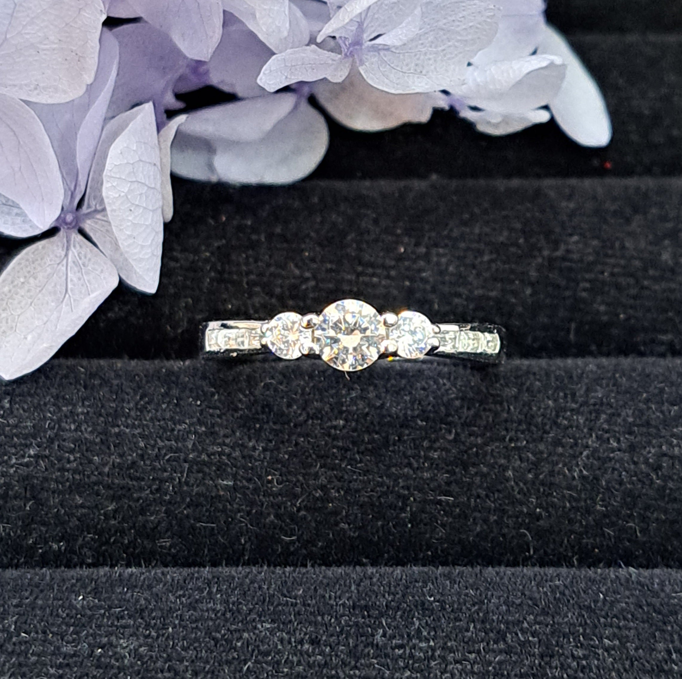 Trilogy Simulated Diamond Side  Baguette Engagement  Ring