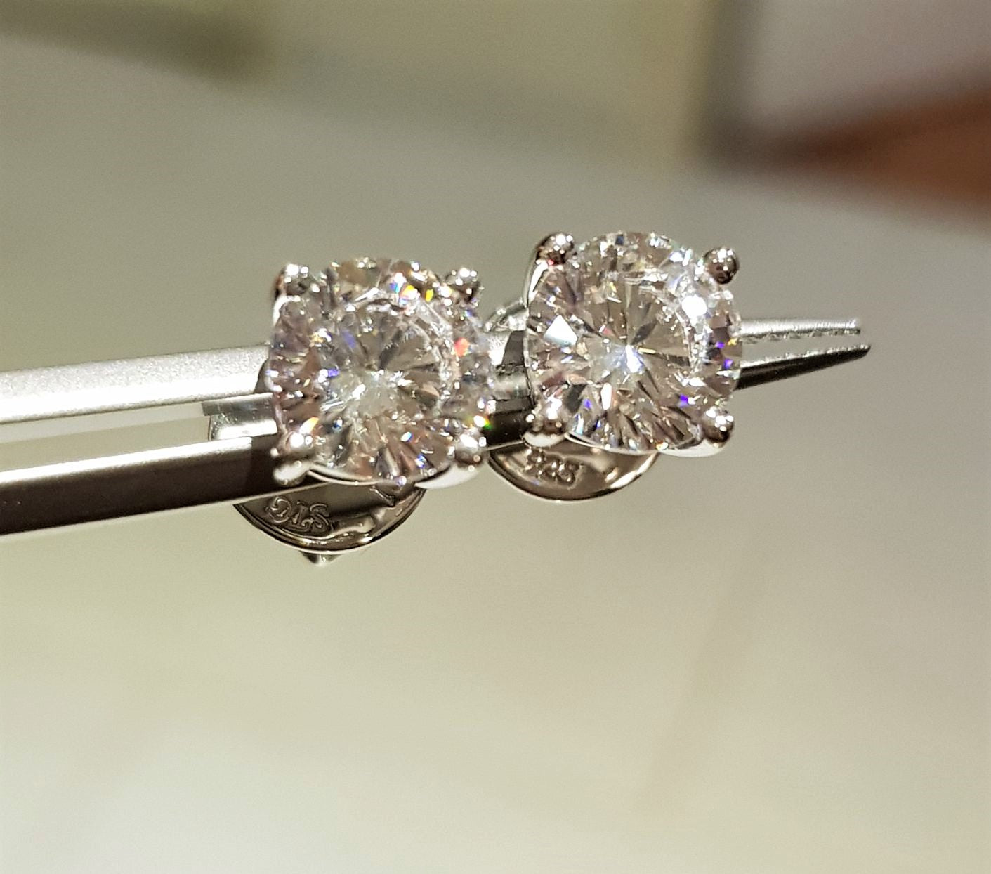 1.25 cts Sparkling Solitaire Earrings