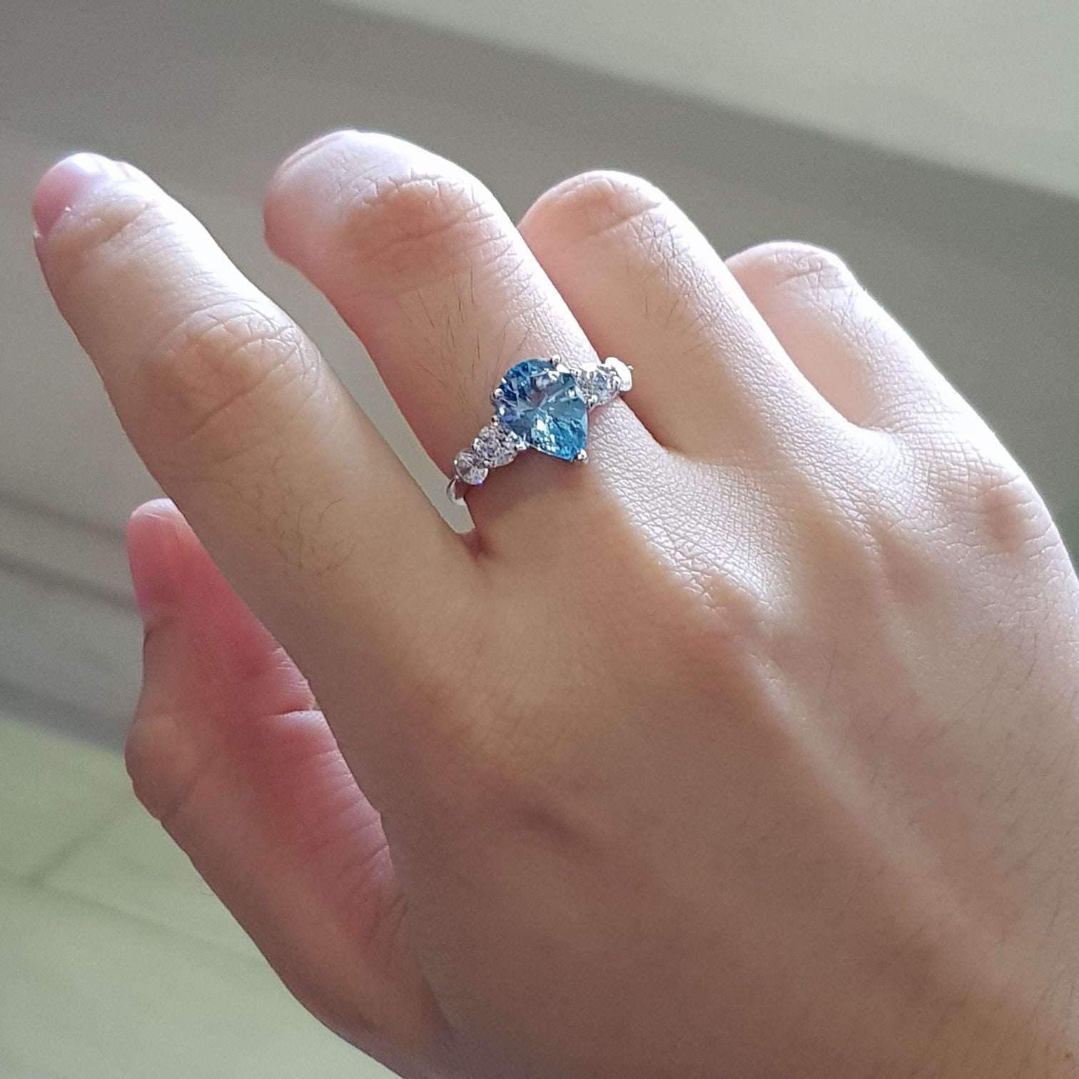 Blue Topaz with round scintilli  Ring