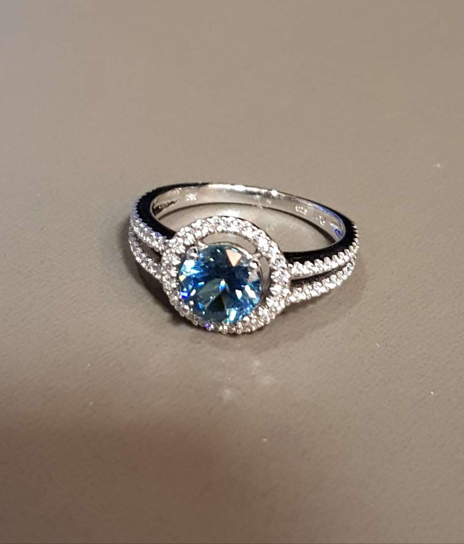 Halo Blue Topaz Ring