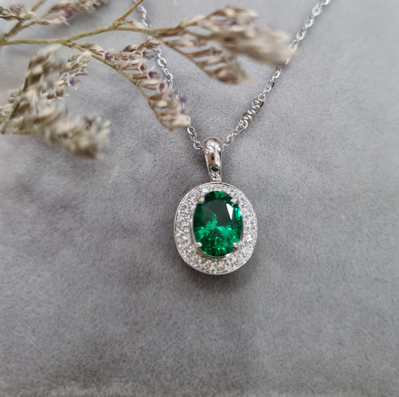 Halo Oval Emerald Pendant