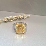 Hidden Halo scintilli with Baguette Canary Ring
