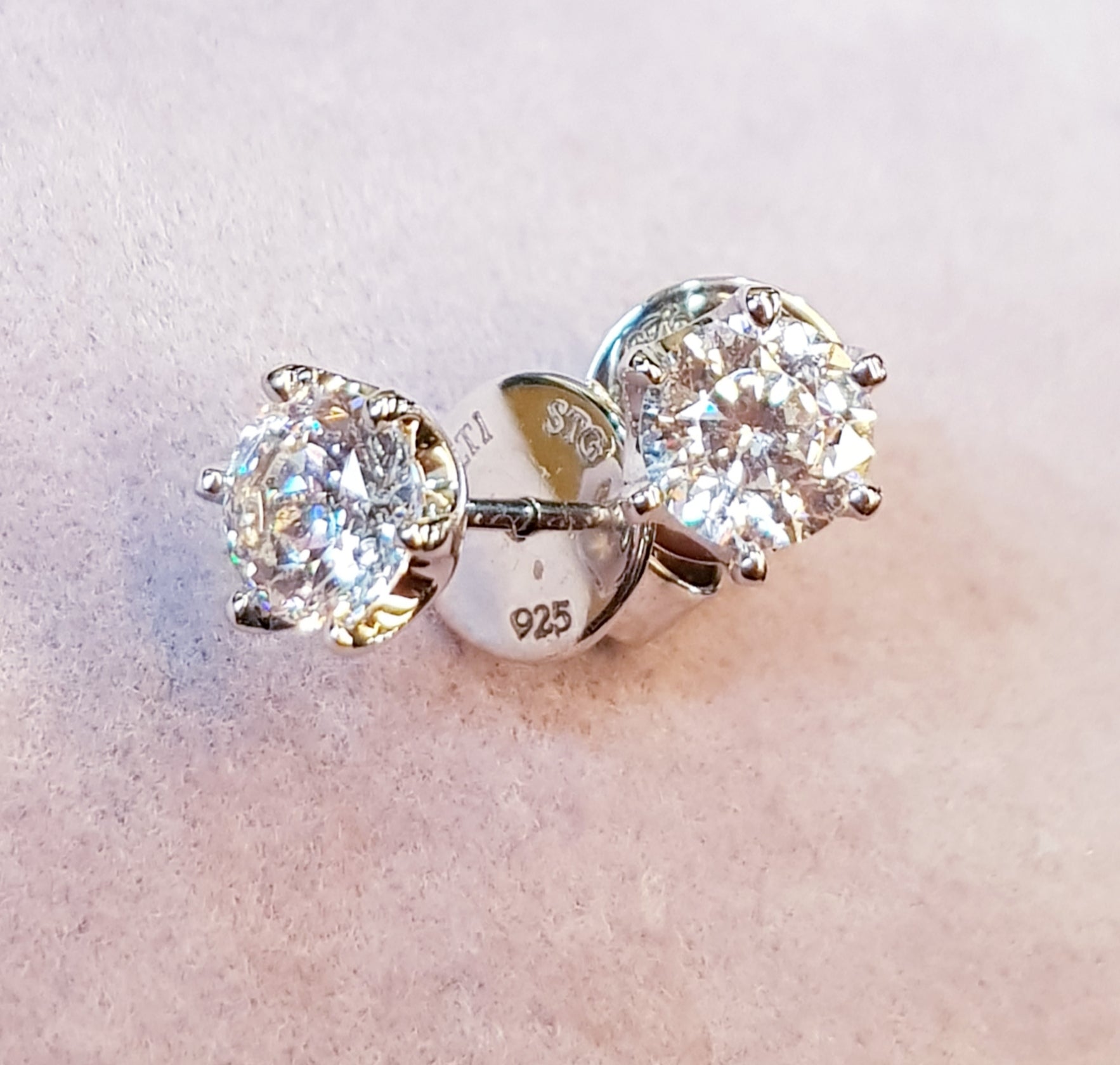 75 carats Solitaire Earrings