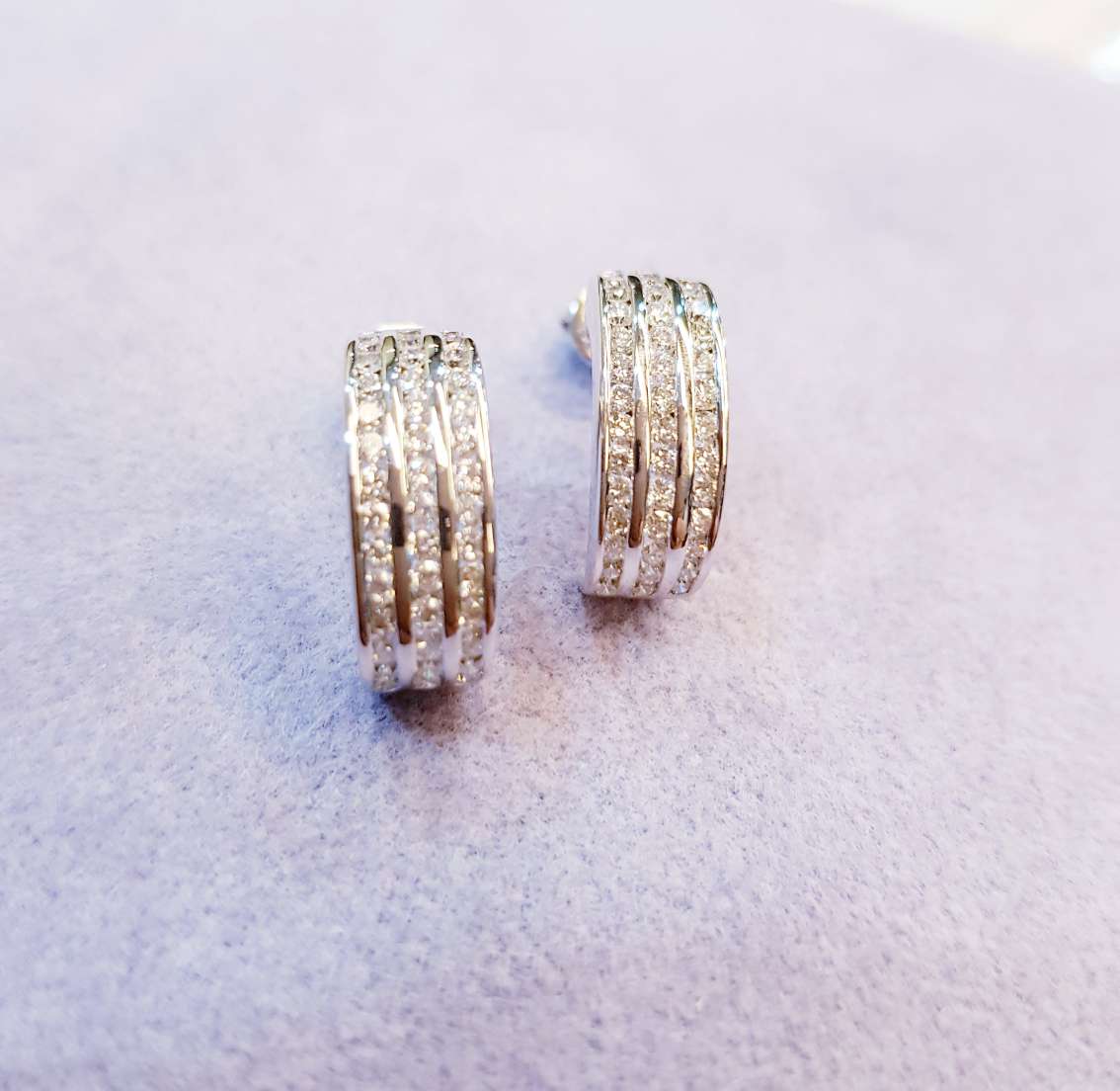 Three roll channel setting Diamond Earrings