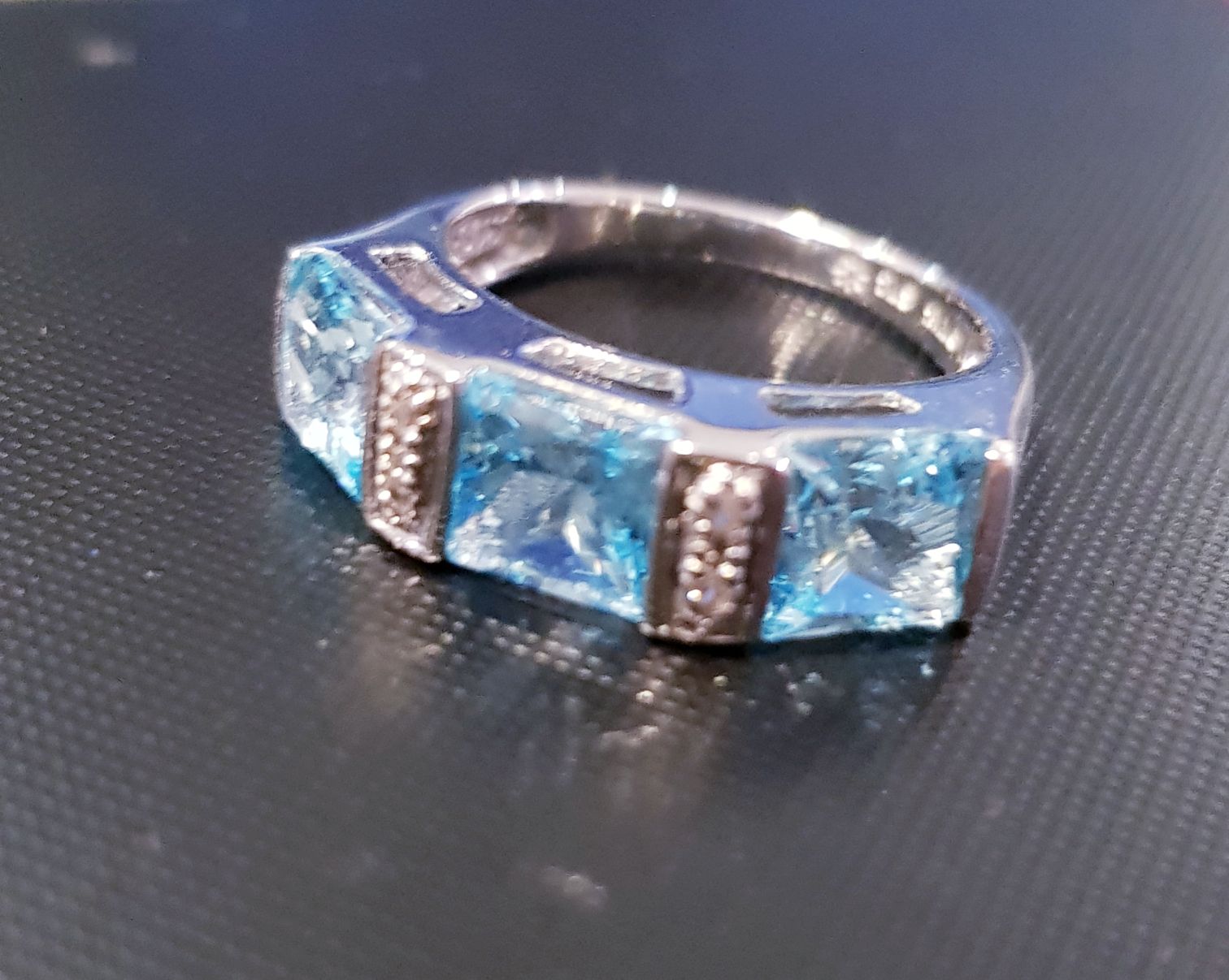 Unique Blue Topaz Ring