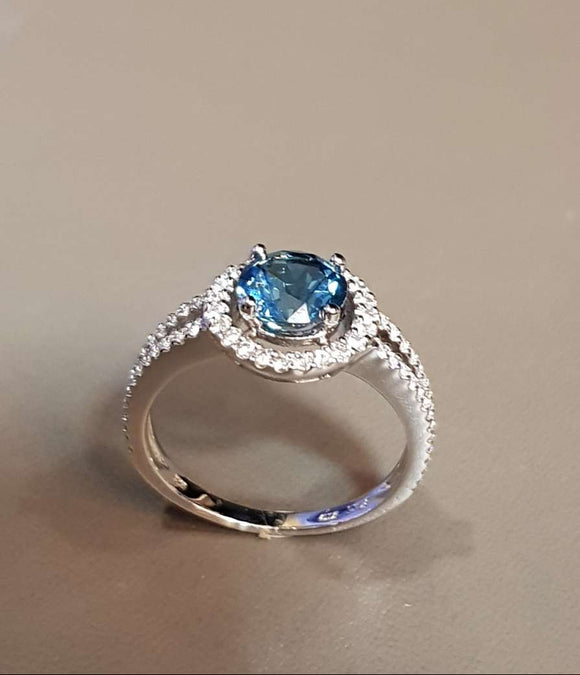 Halo Blue Topaz Ring