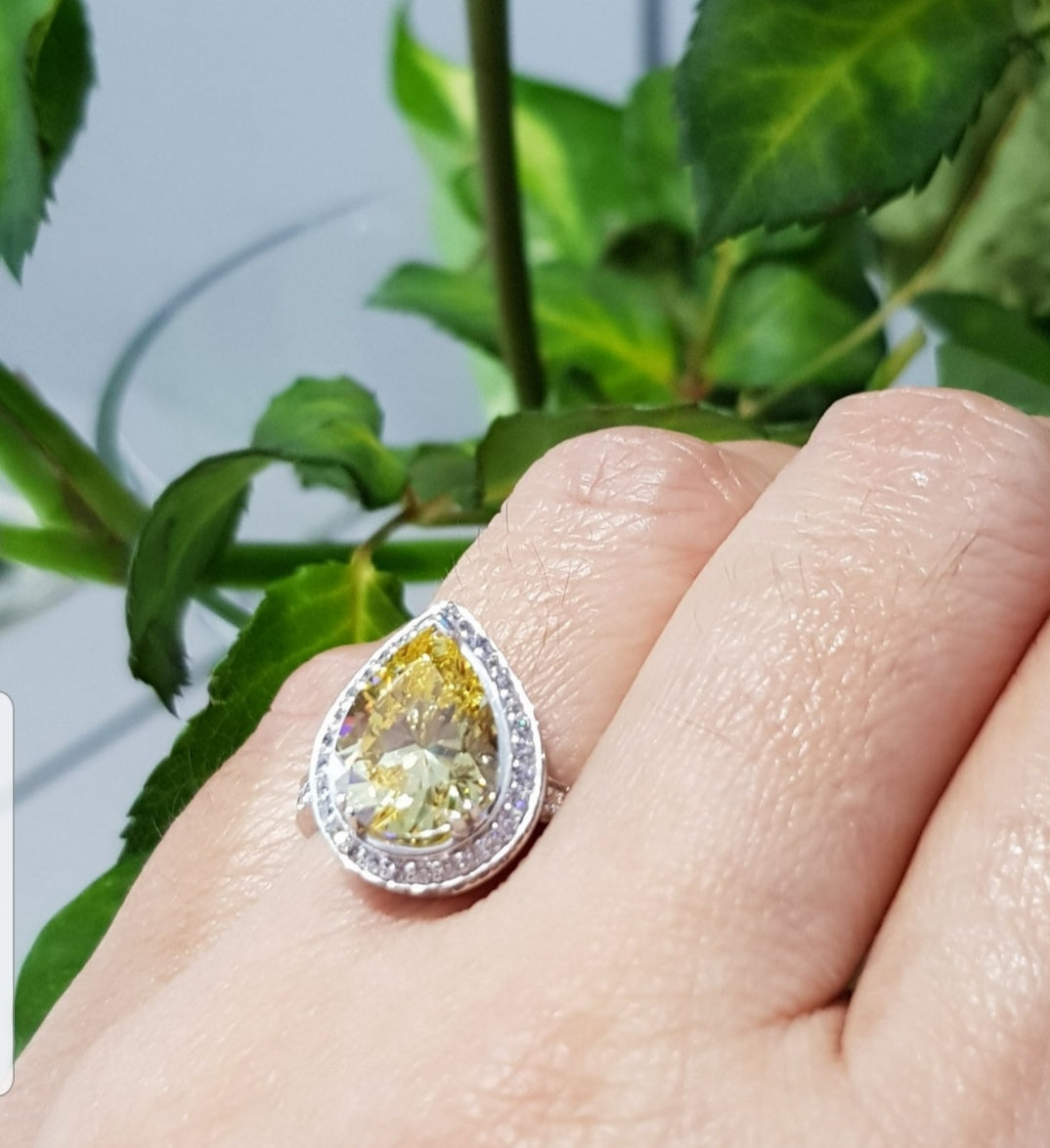 Stunning Halo Simulated Canary Ring