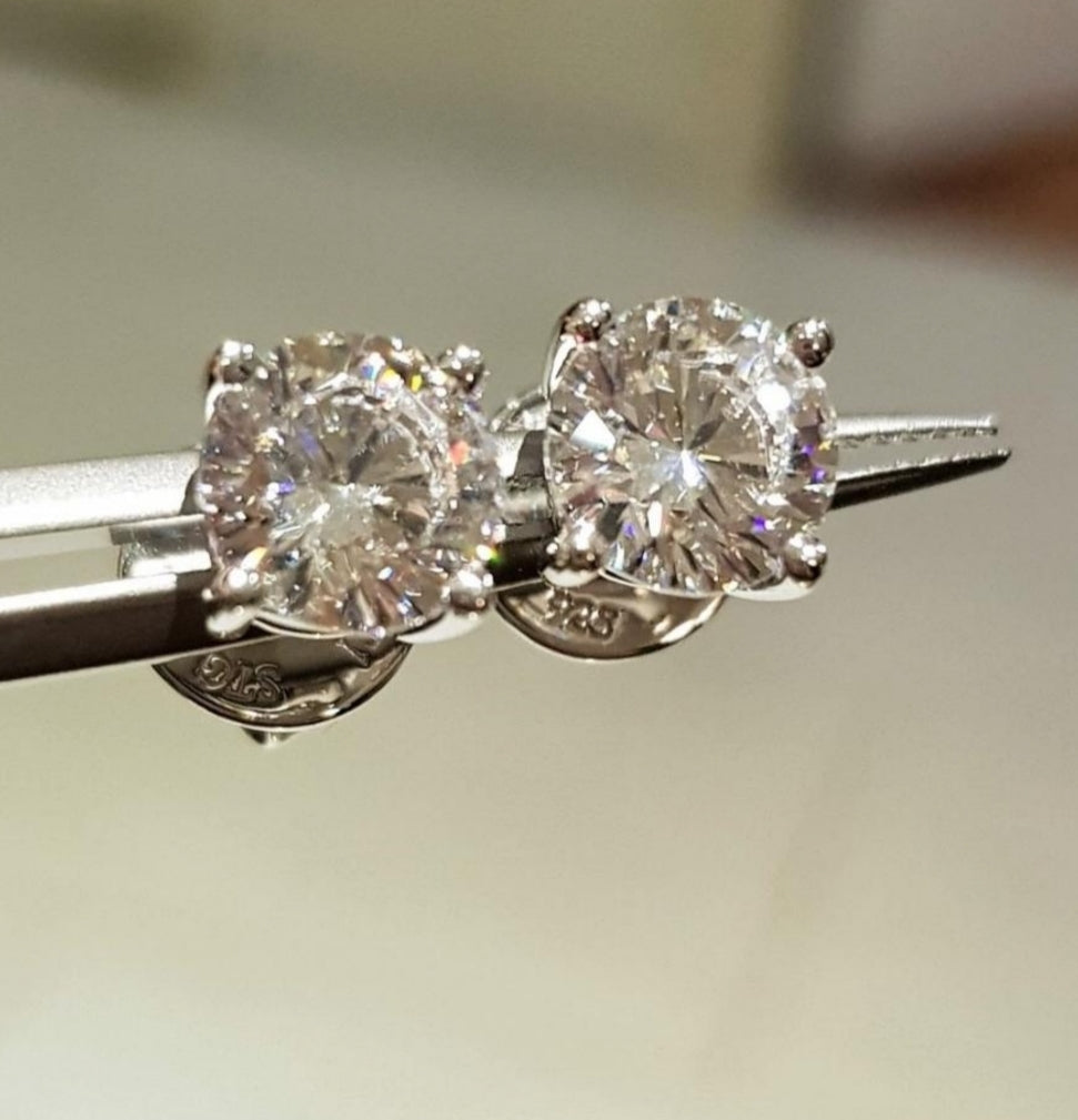 1.25 cts Sparkling Solitaire Earrings