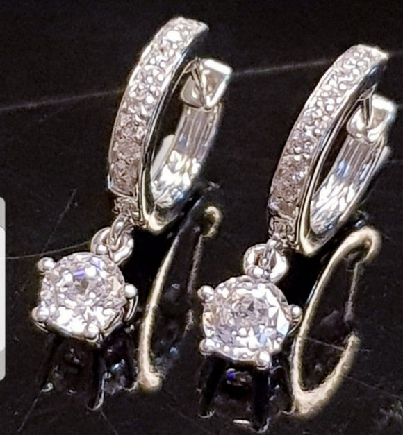 0.63 Carats Centauri Star Scintilli Earring