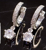 0.63 Carats Centauri Star Scintilli Earring