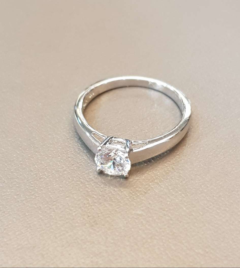 Four Prongs Solitaire Ring