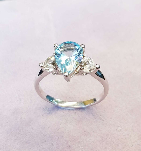 Elegant Blue Topaz Engagement Ring
