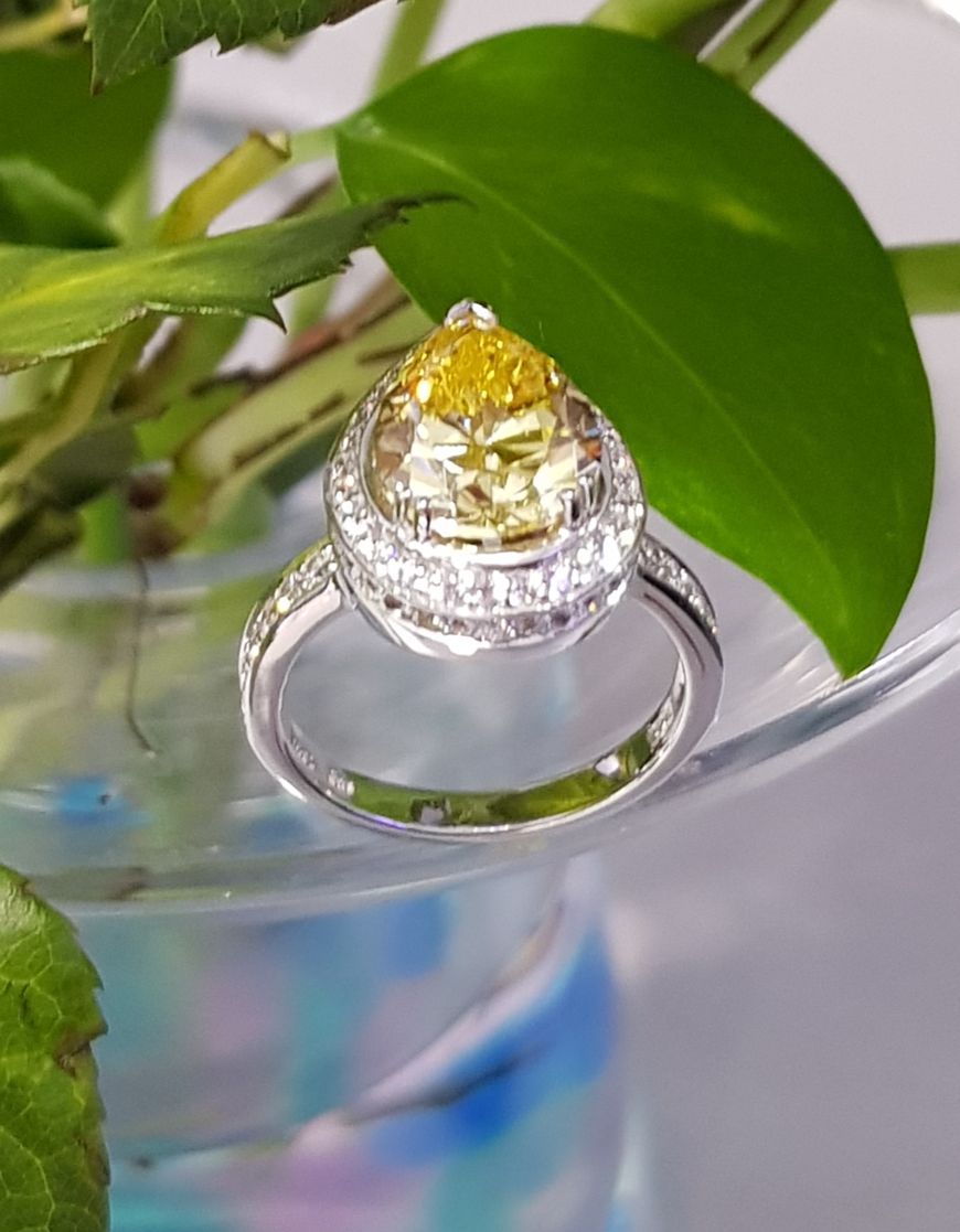 Stunning Halo Simulated Canary Ring