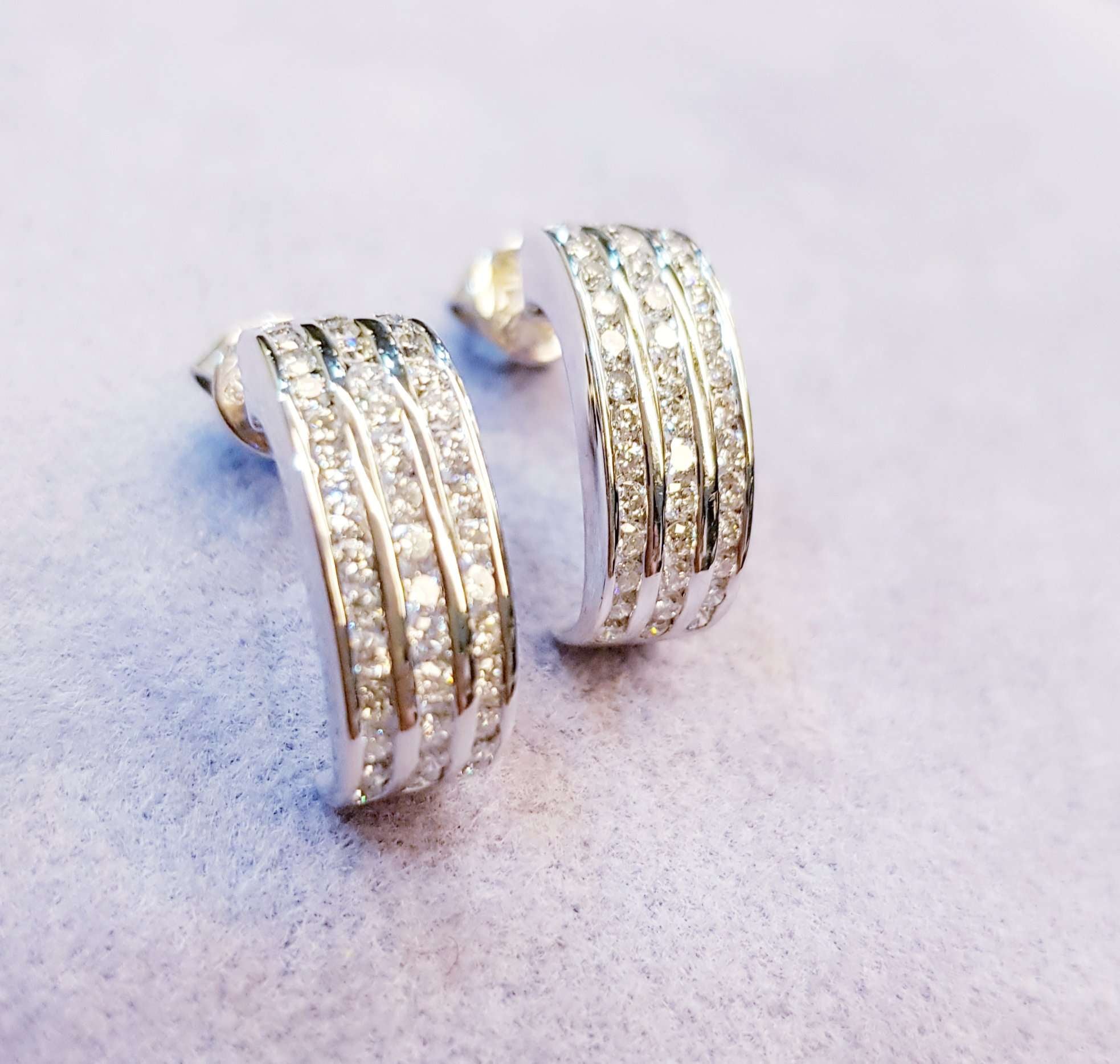 Three roll channel setting Diamond Earrings